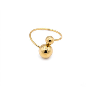 Modern minimalist gold open bypass ring featuring two polished metallic spheres isolated on a white background | J.Collins Jewelry