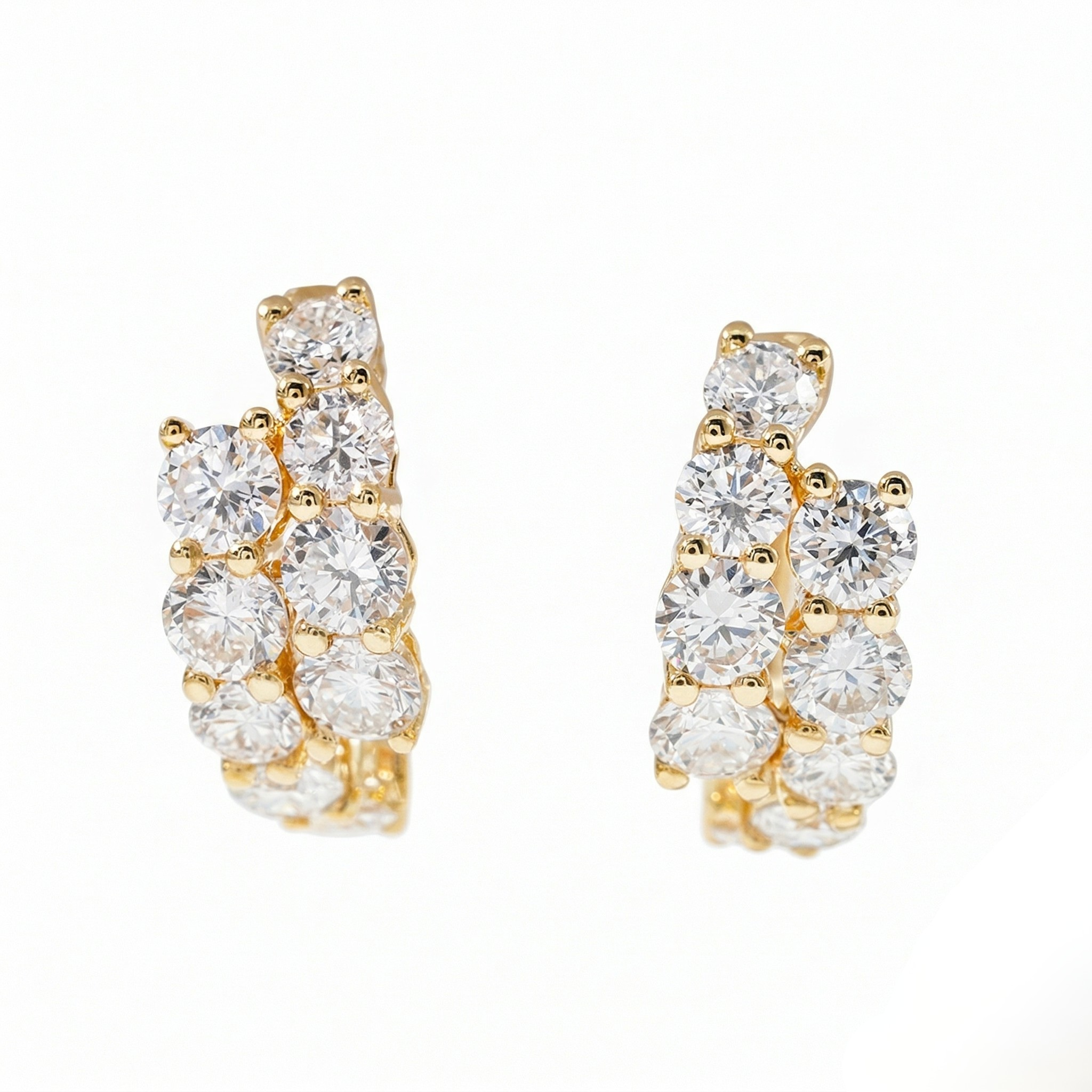 Gold Double Row Round Diamond Cluster Huggie Hoop Earrings on White Background - Double Row Diamond Cluster Huggie Earrings — Gold - J Collins Jewelry 
