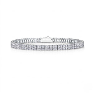 Double-row sterling silver tennis bracelet set with round cubic Moissanite crystals featuring a secure box clasp shown on a plain white background by J.Collins
