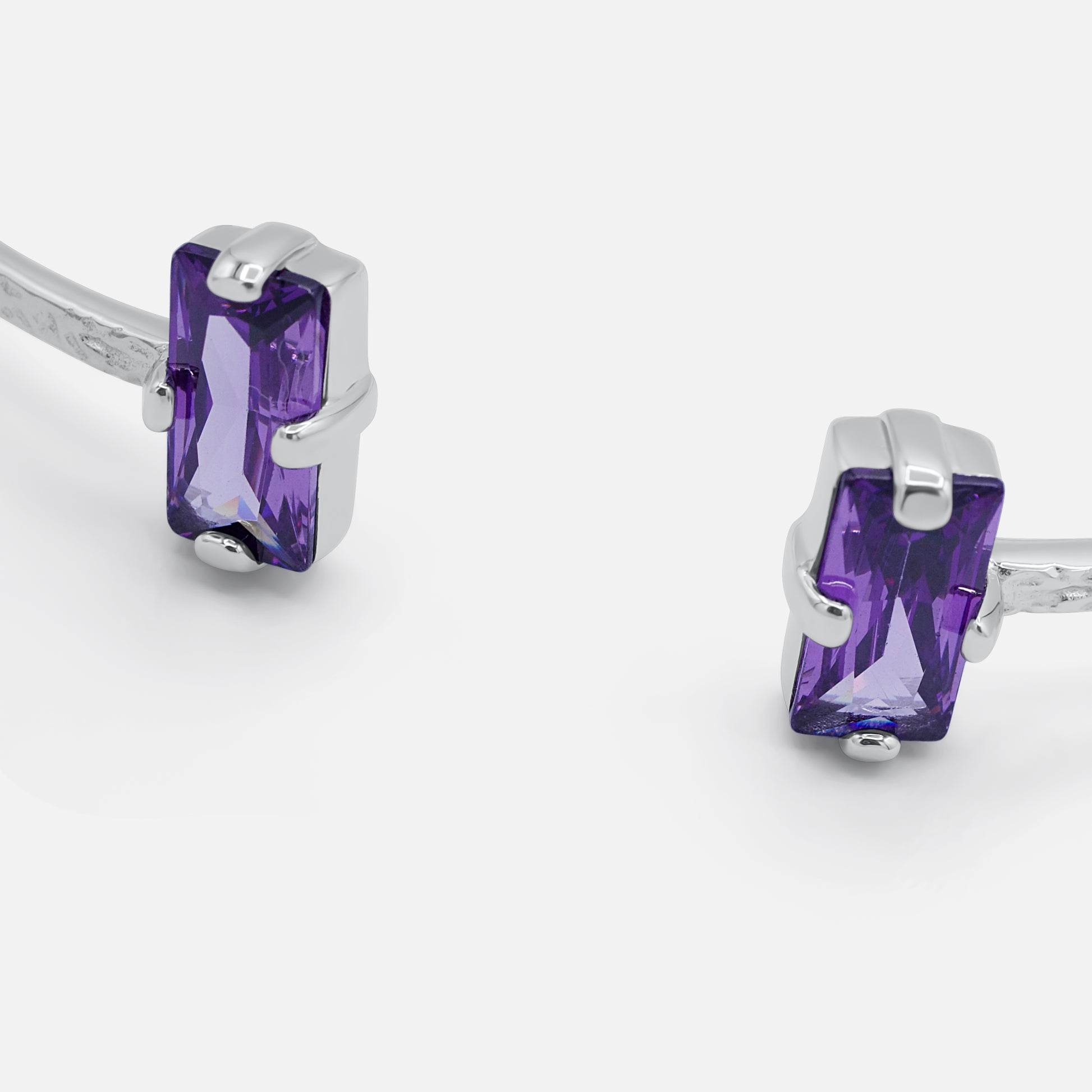 Silver earrings with purple gemstones on a white background  - Duara Cuff Bracelet  - JCollins Jewelry  