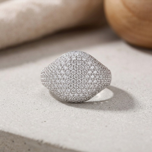 Front view of silver pavé dome signet ring with full-coverage crystal setting by J.Collins  