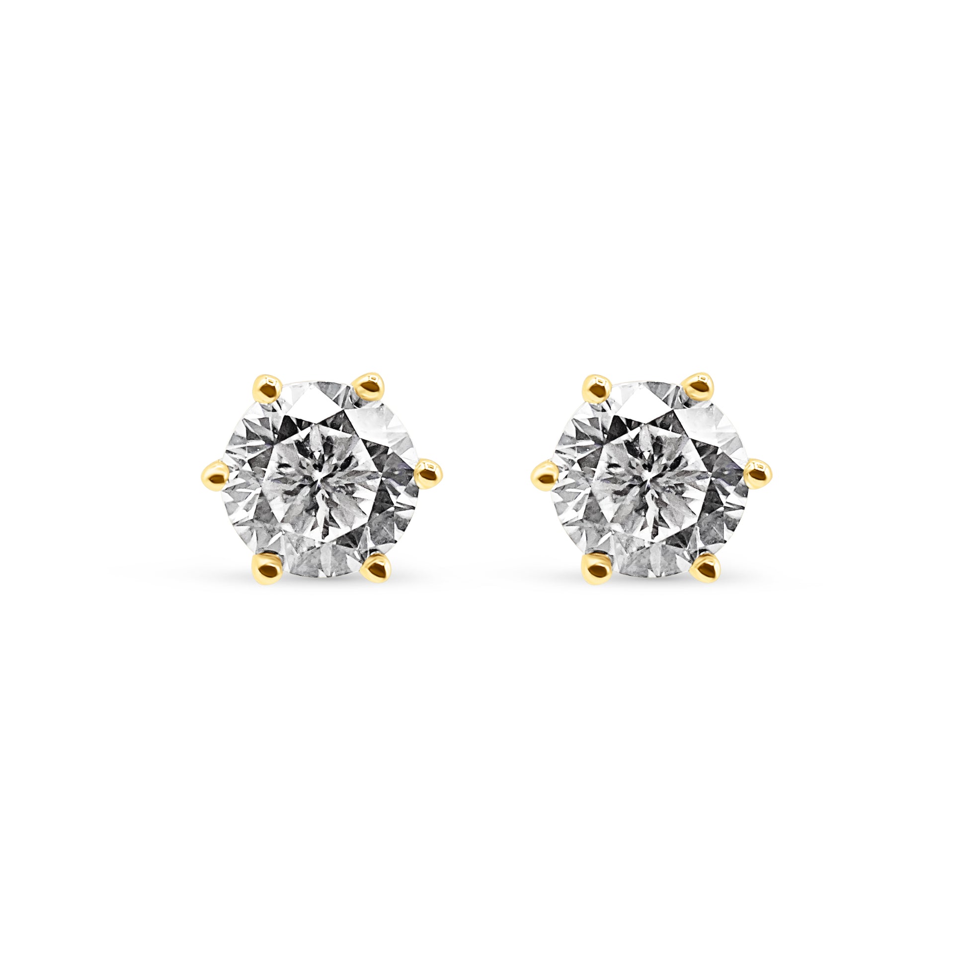 Pair of diamond stud earrings on a white background-Eternal-glow-studs-JCollins Jewelry