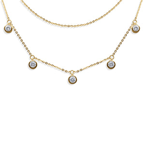 Floating Charm Necklace with small round gemstones on a white background