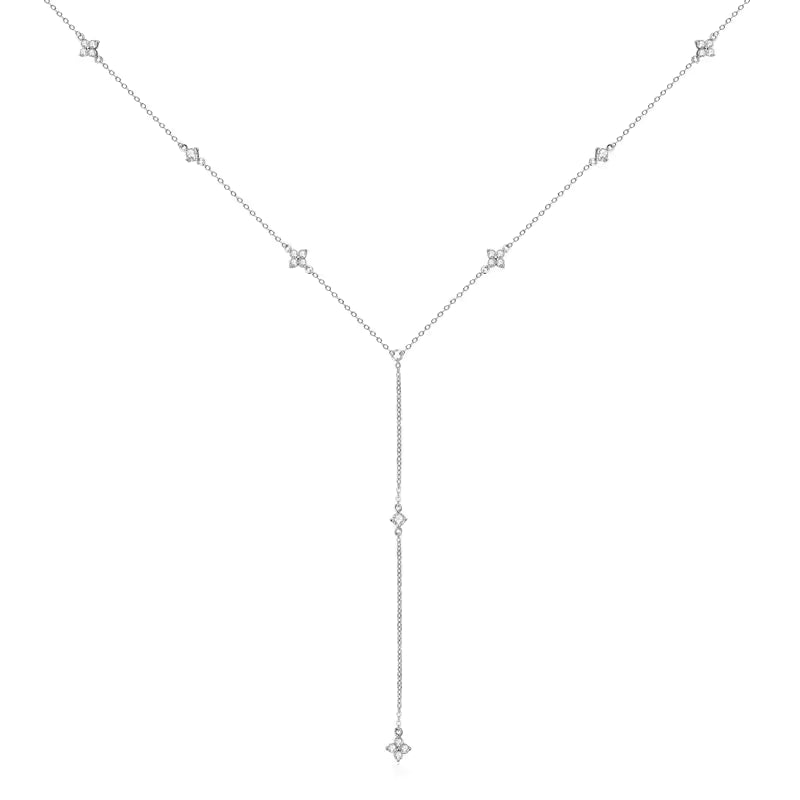 Silver necklace with small diamonds on a white background-J.Collins Jewelry