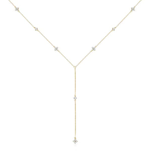 Gold necklace with small diamonds on a white background-J.Collins Jewelry