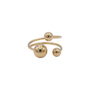 Gold ring with three spherical beads on a white background. J.Collins Jewelry 