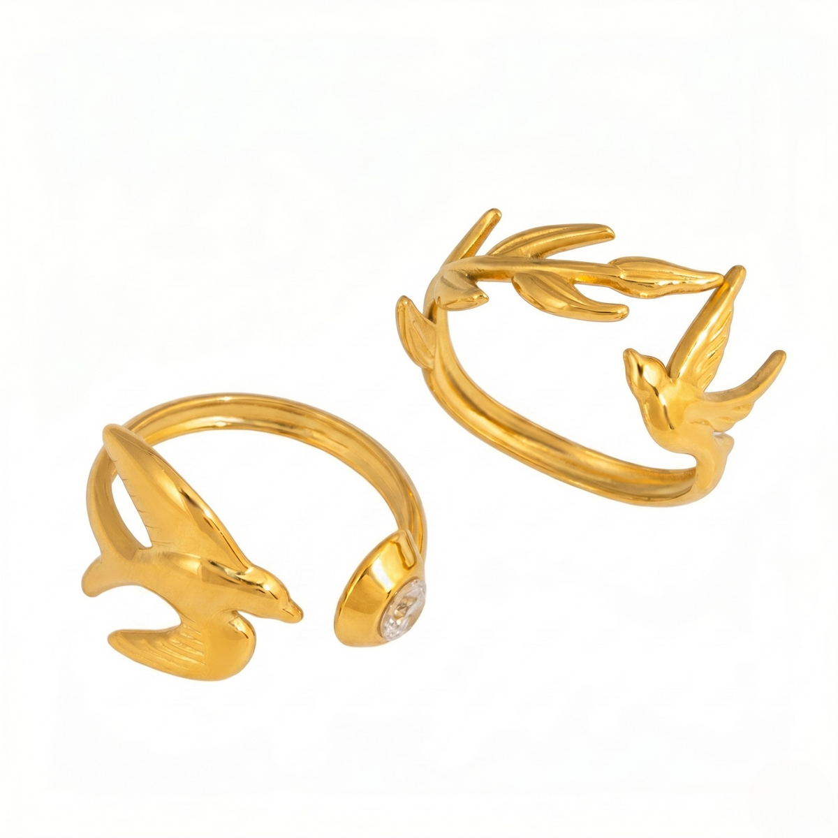 Gold ring set with foliage and bird design, adjustable, featuring a small clear stone - J.Collins Jewelry