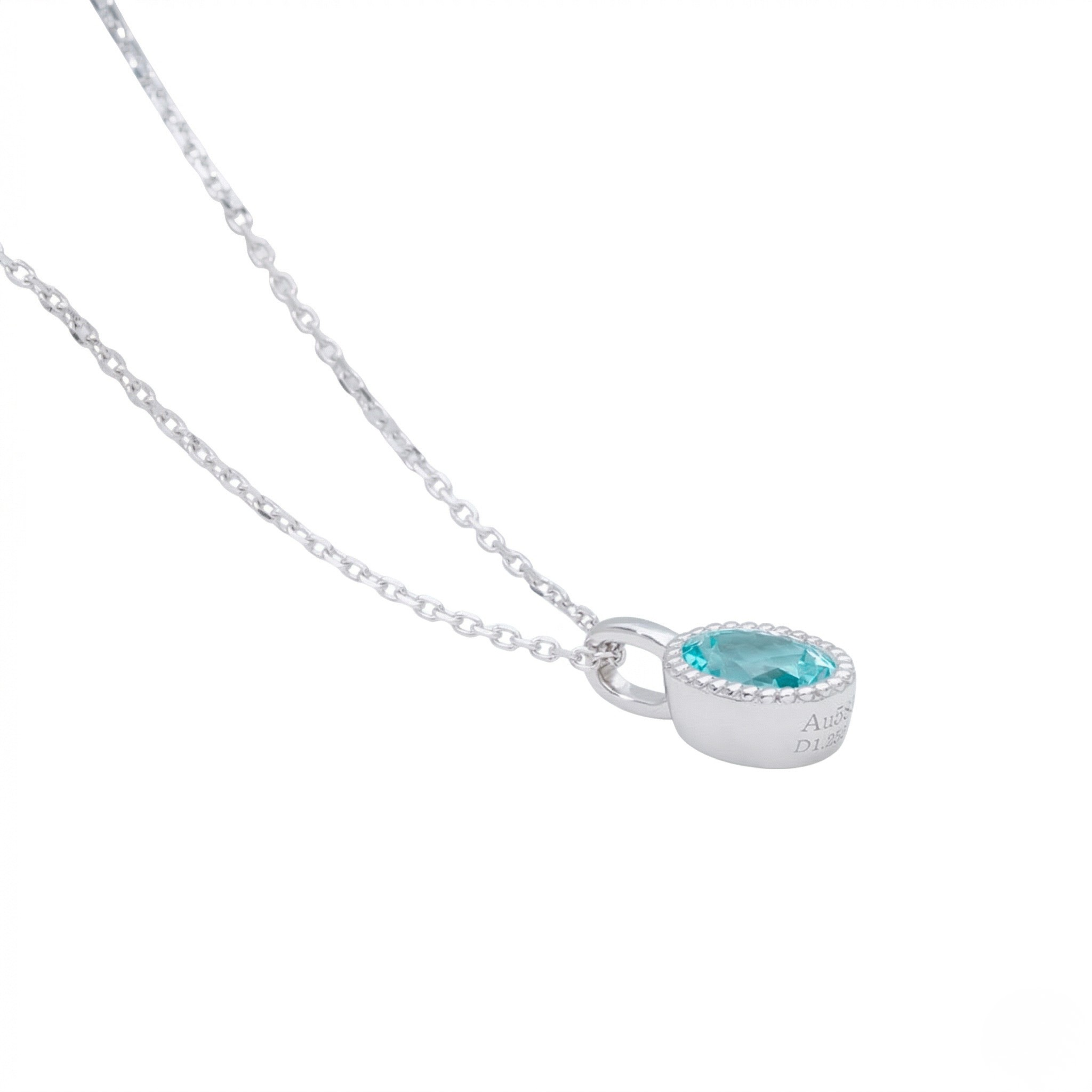Silver necklace with a blue gemstone pendant on a white background - J Collins Jewelry 