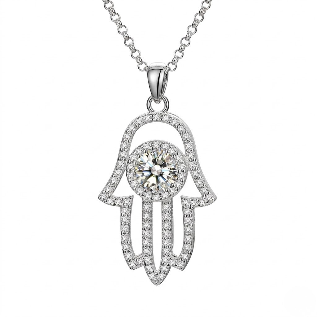 Sterling silver Hamsa hand pendant necklace set with pave cubic Moissanite and a round center stone shown on a plain white background by J.Collins
