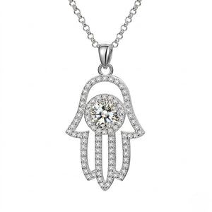 Sterling silver Hamsa hand pendant necklace set with pave cubic Moissanite and a round center stone shown on a plain white background by J.Collins
