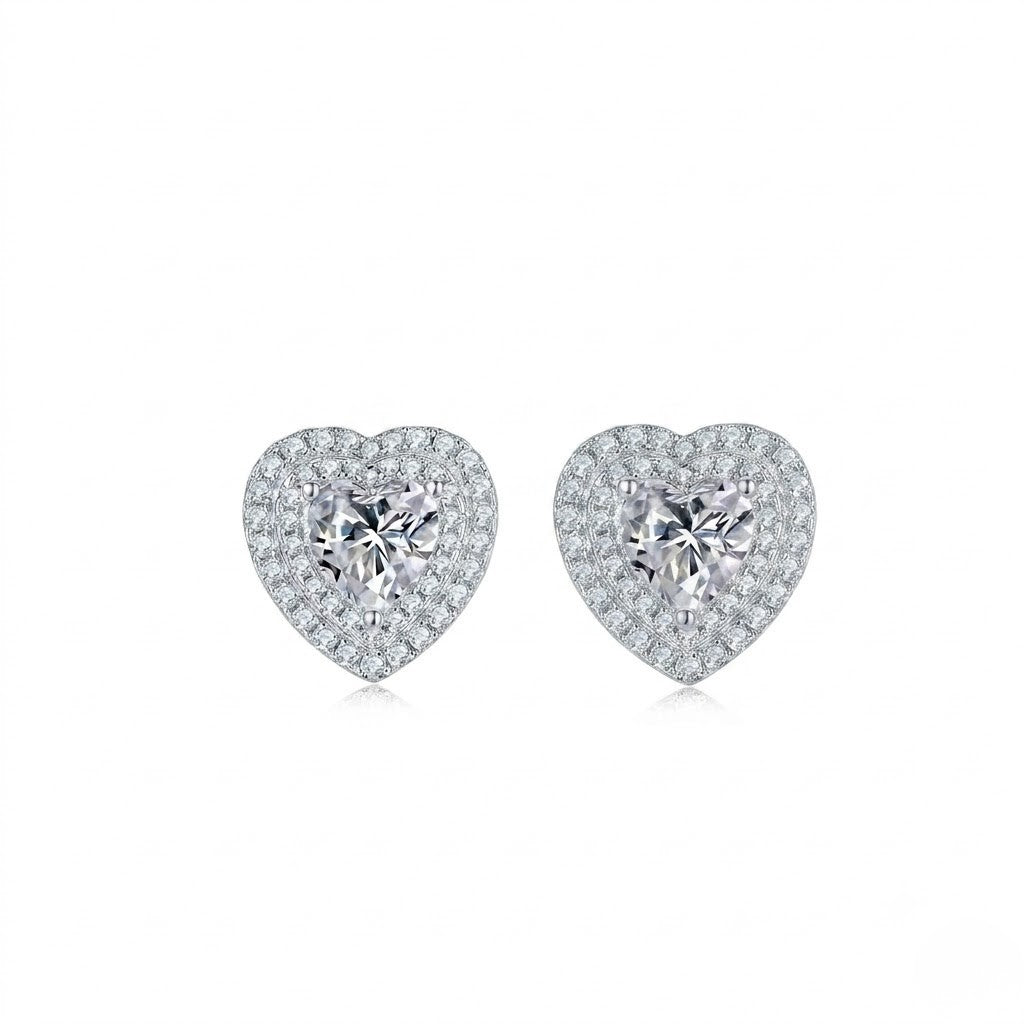 Pair of heart-shaped stud earrings with double halo pavé cubic zirconia detail - J.Collins Jewelry