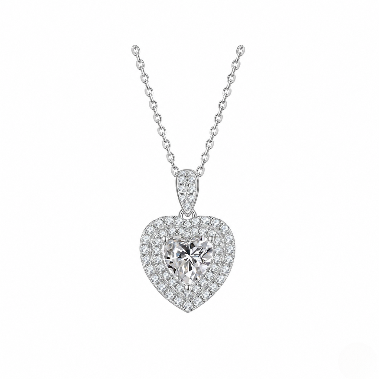 Heart-shaped diamond pendant on a white background