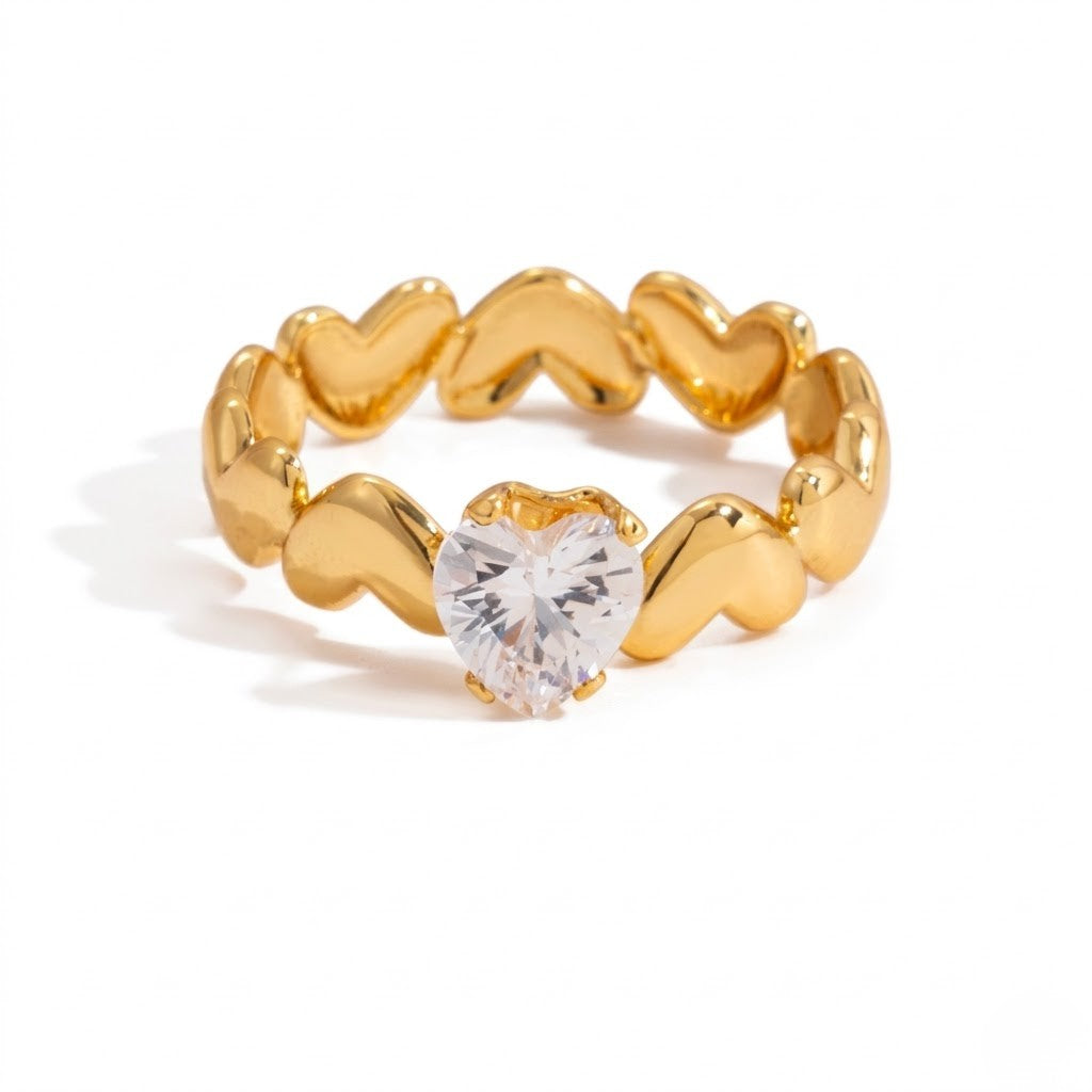 Gold heart solitaire ring with a heart-shaped clear gemstone centerpiece - J.Collins Jewelry