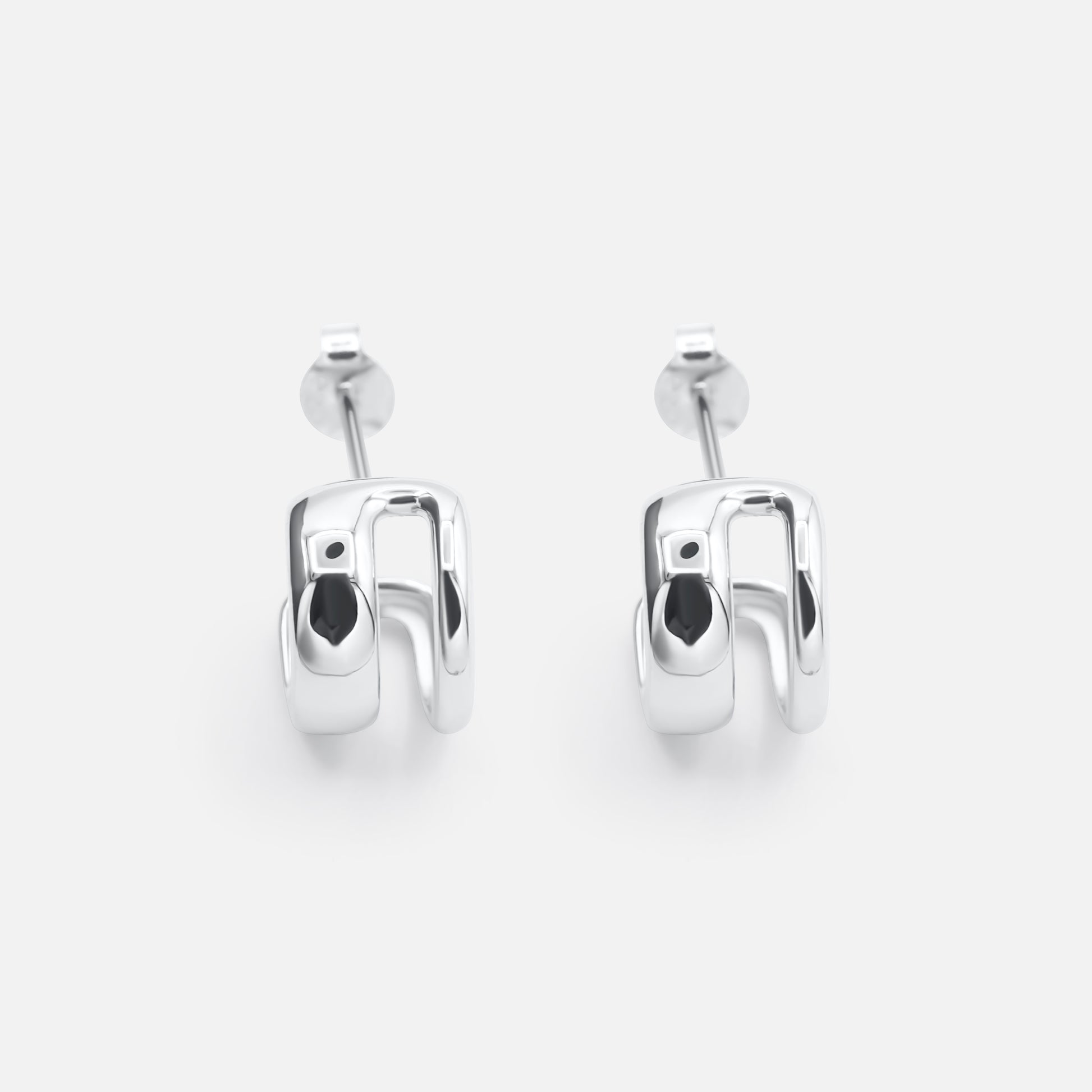 Pair of silver hoop earrings on a white background  - Hera Hoop - JCollins Jewelry 
