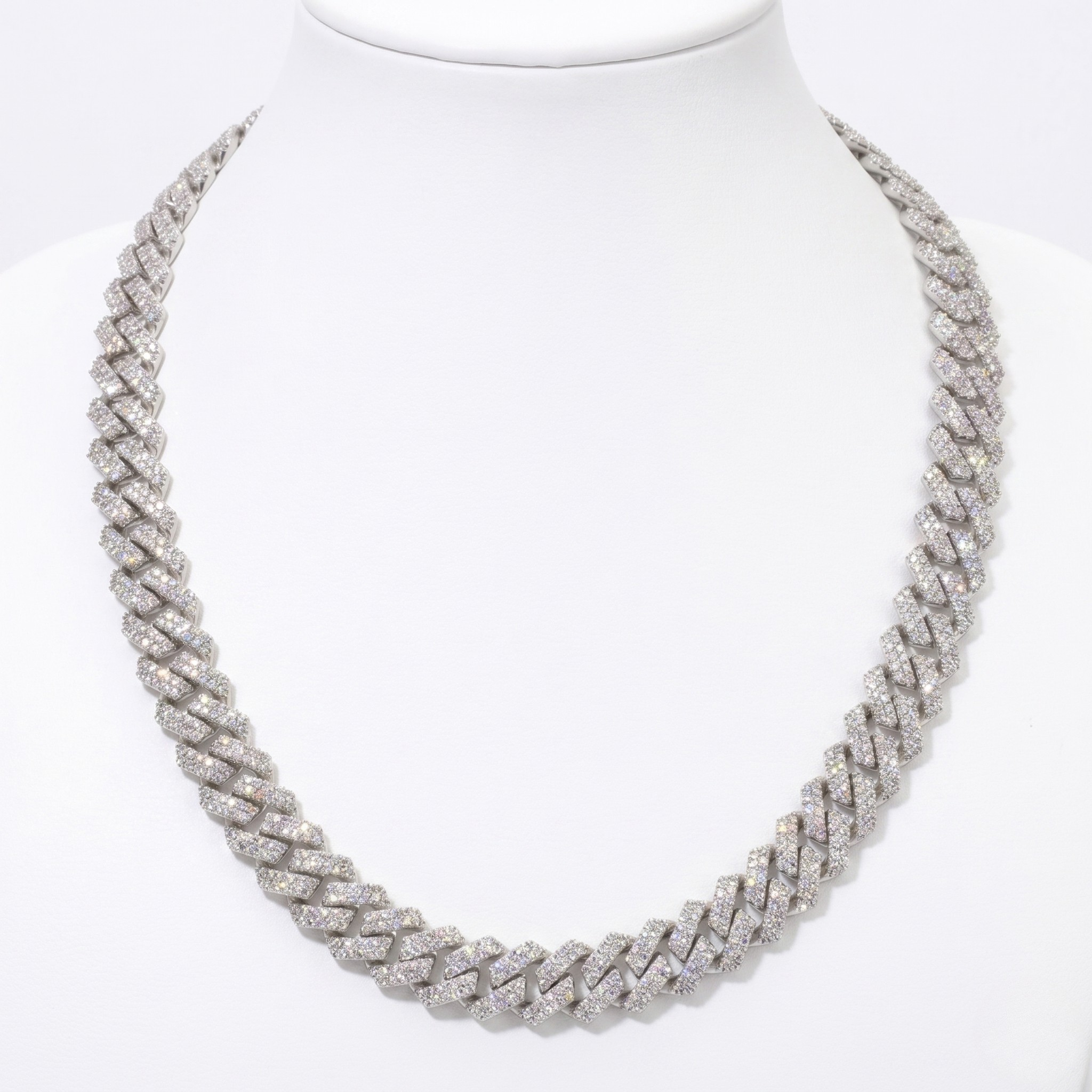 Luxury diamond Cuban link chain necklace in white old with fully iced-out interlocking links, displayed on a white jewelry bust against a clean background  - Iced_Out_Cuban_10mm - J.Collins Jewelry 