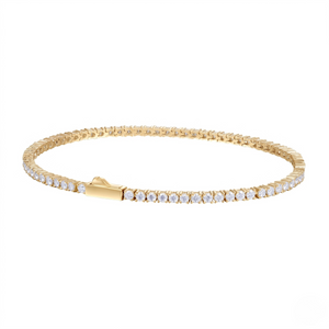 Gold bracelet with diamond accents on a white background - Icon Tennis Link Bracelet - J. Collin’s Jewelry 