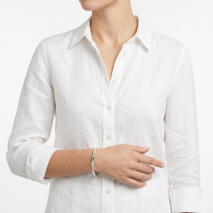 White button-up shirt worn by a person on a white background-J.Collins Jewelry