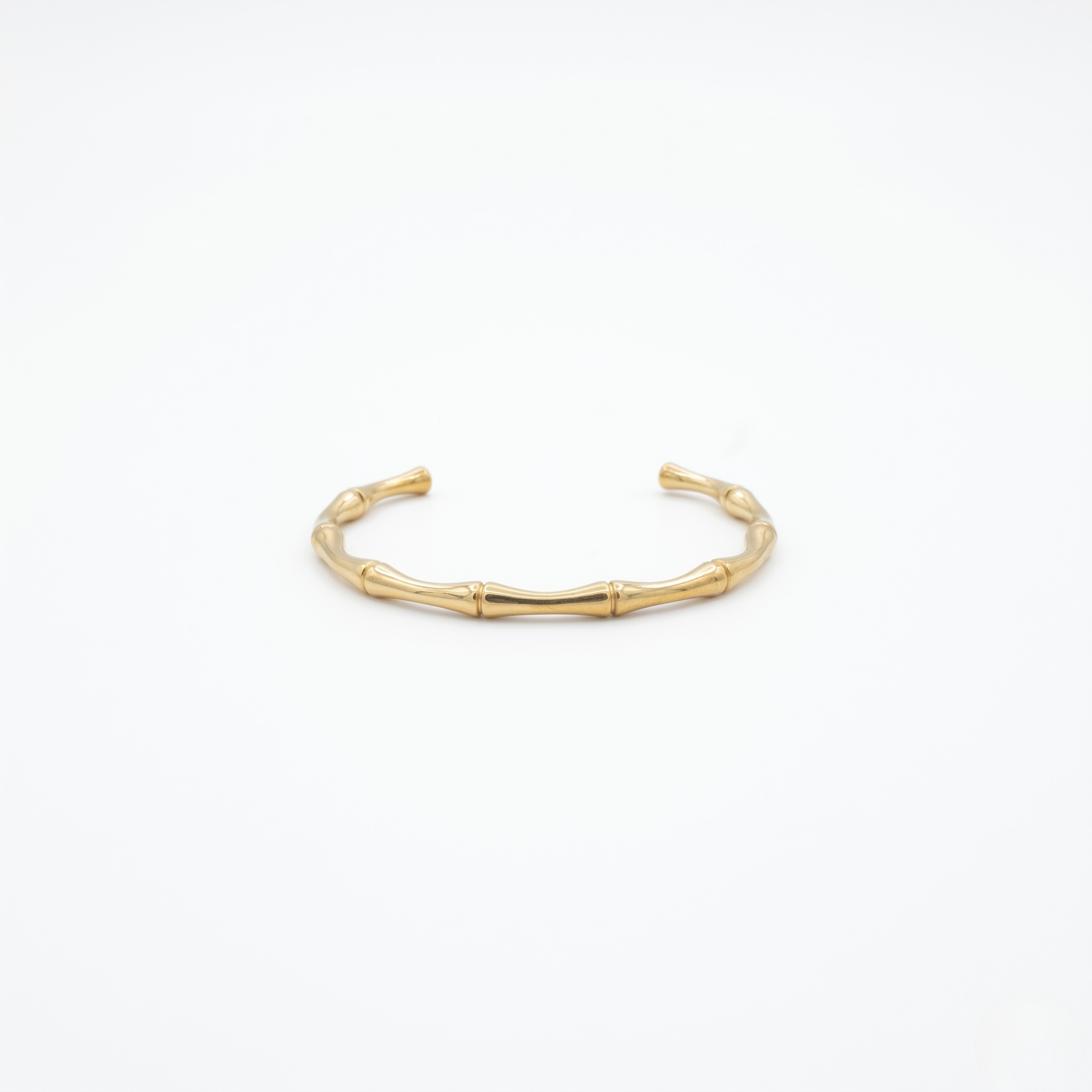 Gold bracelet on a white background-J.Collins Jewelry