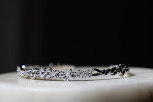 Silver bracelet with clear stones on a dark background-Crystal-Eclat-Cuff-JCollins-Jewelry