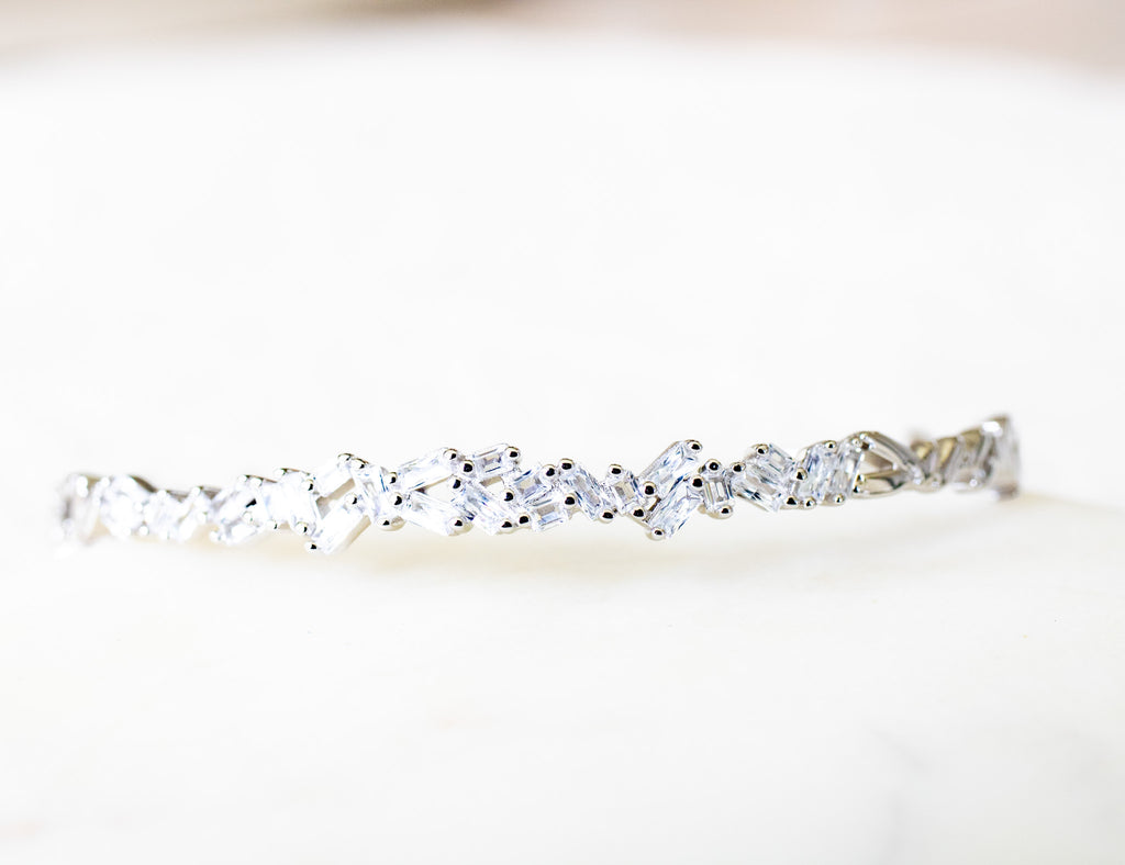 Diamond ring with a white background-Crystal-Eclat-Cuff-JCollins-Jewelry