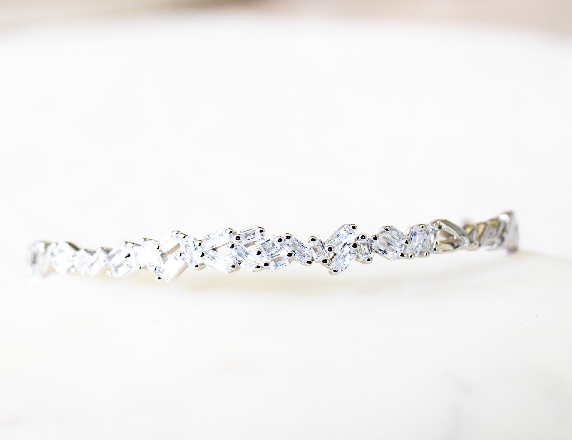 Diamond ring with a white background-Crystal-Eclat-Cuff-JCollins-Jewelry