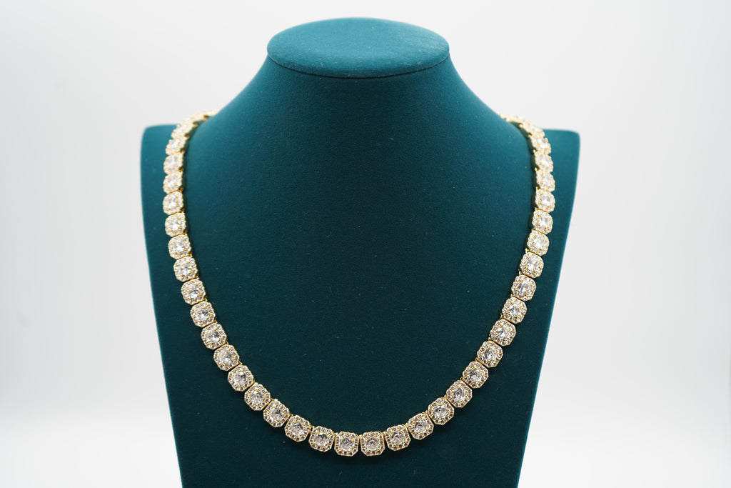 Diamond necklace on a green mannequin bust with a white background-10mm-Tennis-Chain-JCollins-Jewelry