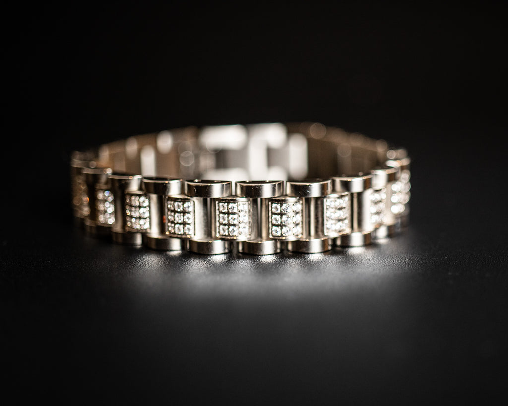 Silver bracelet with embedded stones on a black background-Vanguard-Bracelet-JCollins-Jewelry