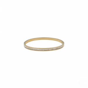 Gold bracelet with small stones on a white background-J.Collins Jewelry