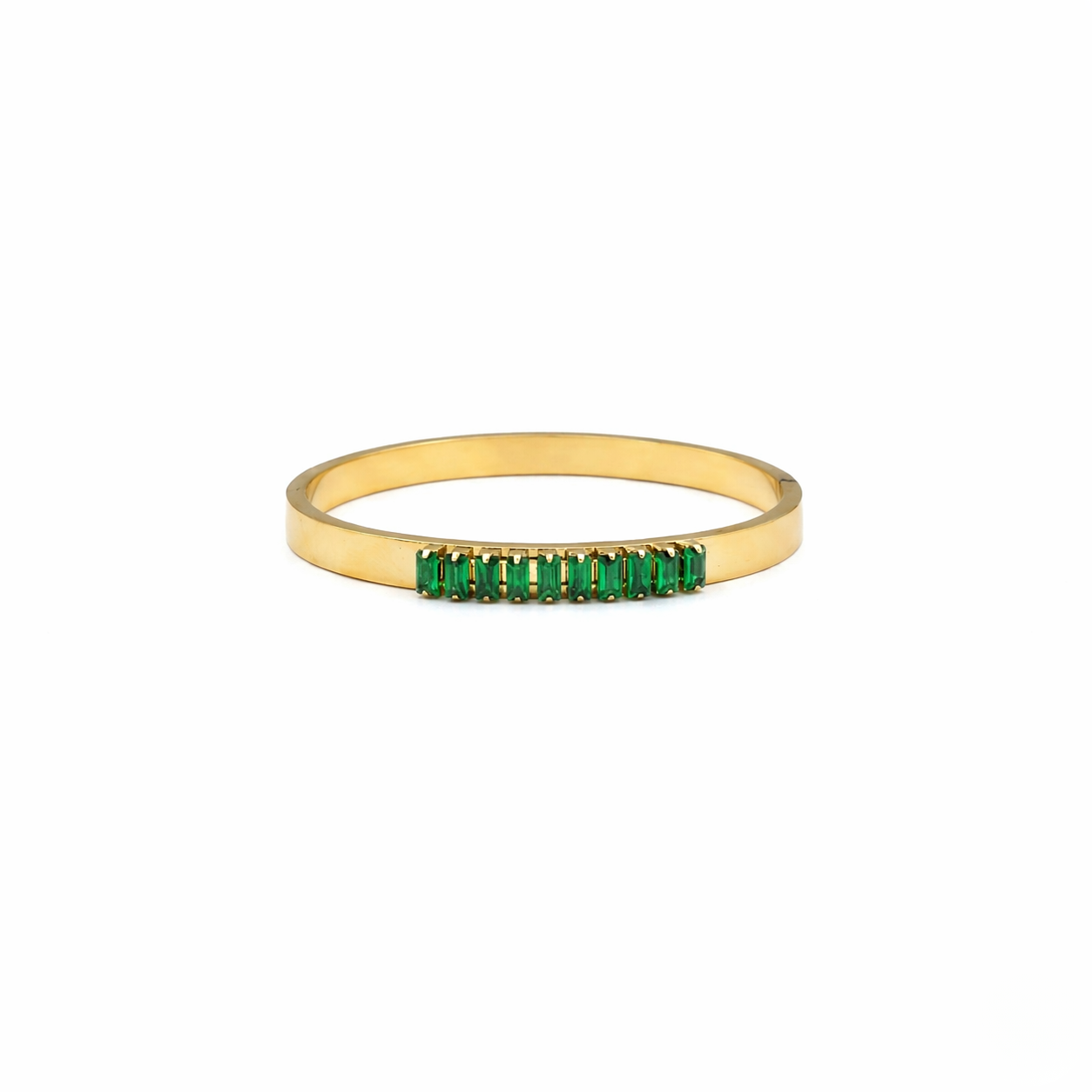Gold ring with green gemstones on a white background- J.Collins Jewelry