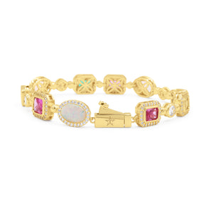 Regal Gold bracelet with gemstones on a white background-