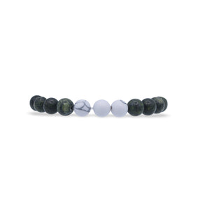 Set of round, multicolored beads on a white background-J.Collins Jewelry