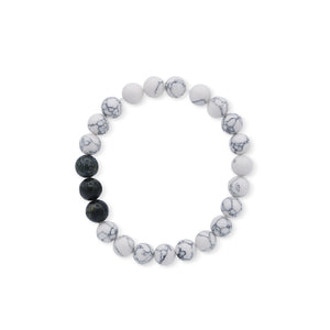 Bracelet with alternating black and white beads on a white background-J.Collins Jewelry