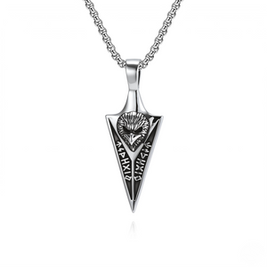Nordic Totem Pendant in silver with runic engravings and lion design, on a textured chain necklace.