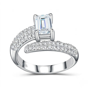 White-gold ring with a large central gemstone and smaller stones on a white background - J.Collins Jewelry