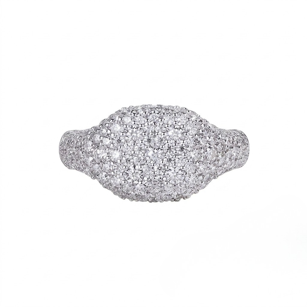 Top-down view of sterling silver pavé dome signet ring fully encrusted with micro-paved cubic Moissanite crystals shown on a plain white background by J.Collins

