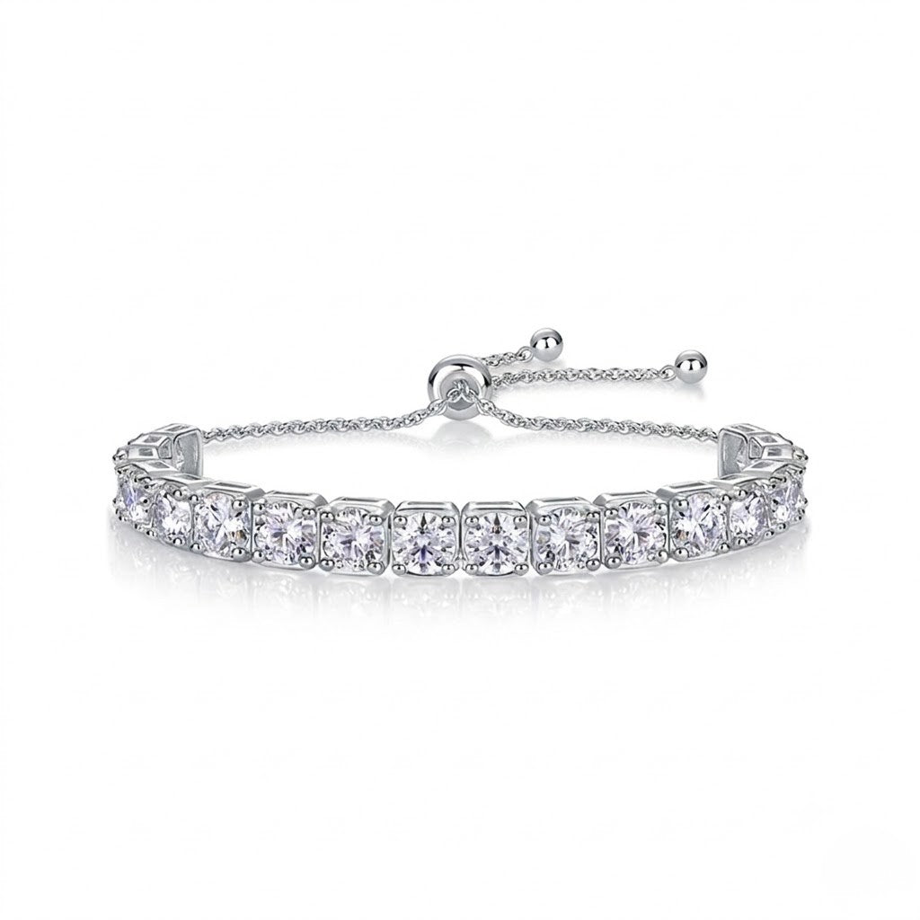 White gold bracelet with clear gemstones on a white background- J.Collins Jewelry