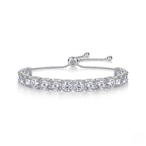 White gold bracelet with clear gemstones on a white background- J.Collins Jewelry