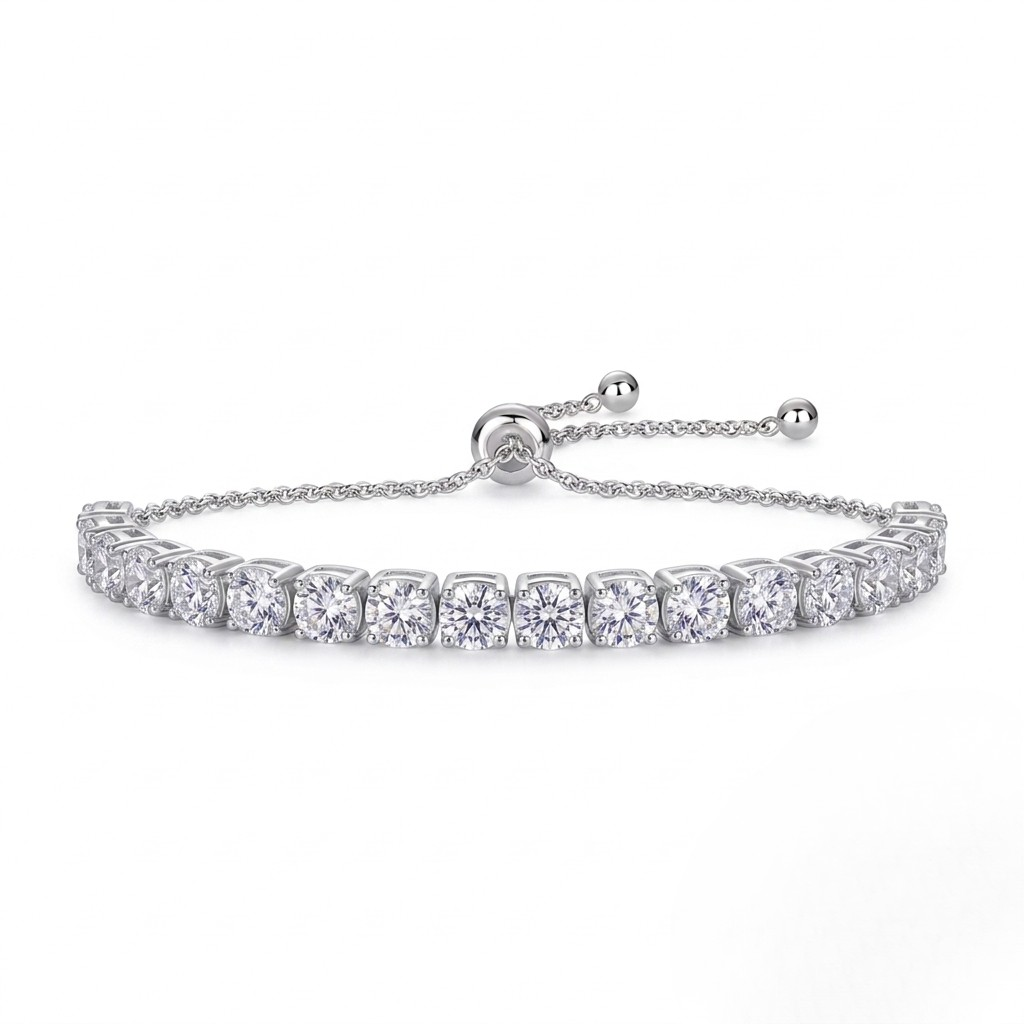 White gold bracelet with clear gemstones on a white background- J.Collins