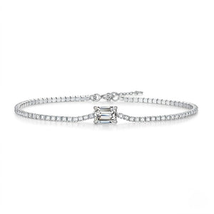 Diamond bracelet with a central square-cut gemstone on a white background - J.Collins Jewelry