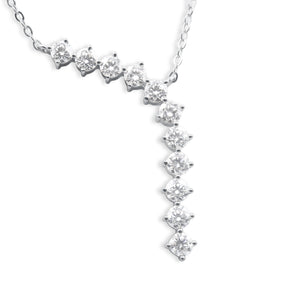 Close-up of graduating cubic zirconia crystal drop pendant on silver chain, prong-set round stones in cascading diagonal line - Ruby Waterfall Necklace by J.Collins Jewelry 