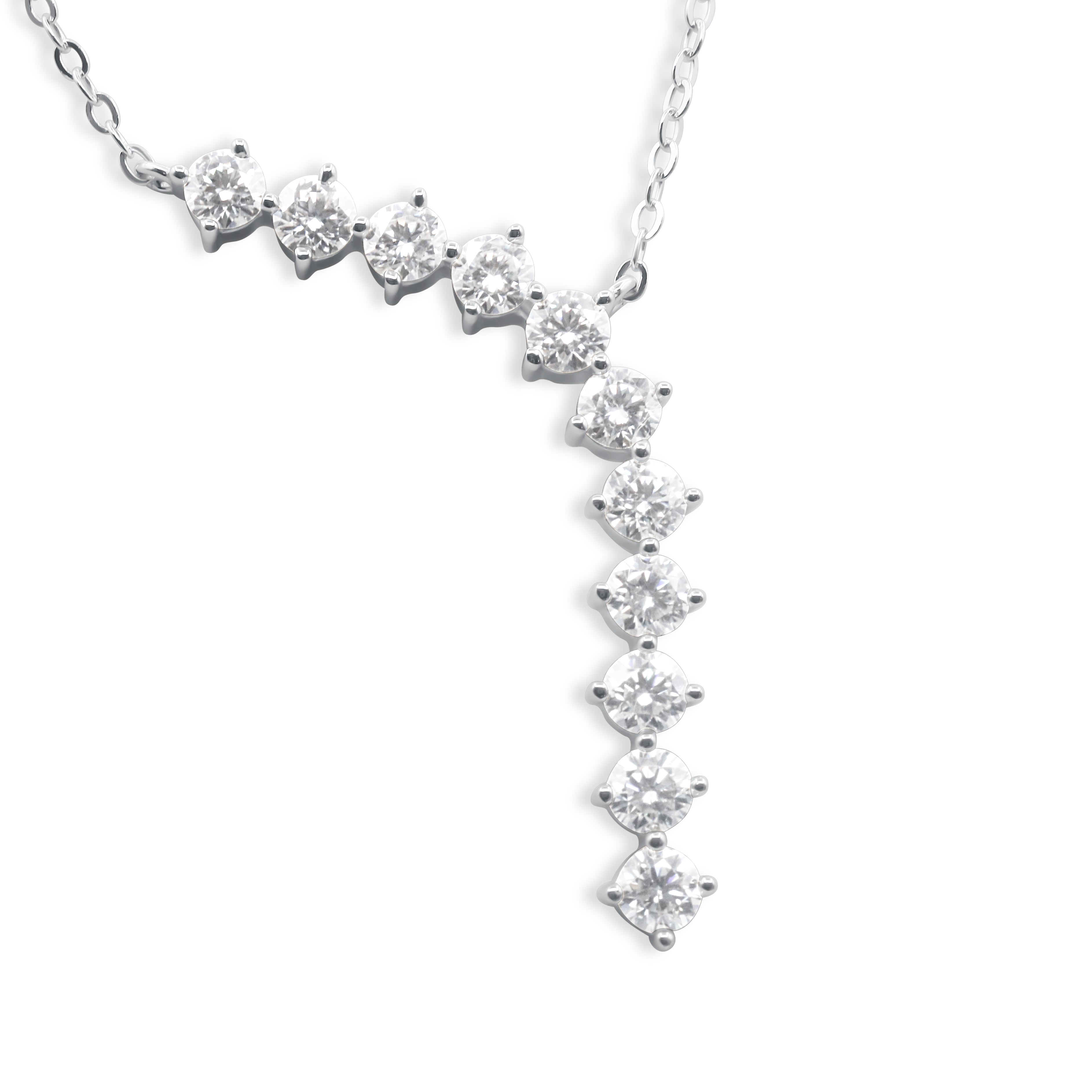 Close-up of graduating cubic zirconia crystal drop pendant on silver chain, prong-set round stones in cascading diagonal line - Ruby Waterfall Necklace by J.Collins Jewelry 