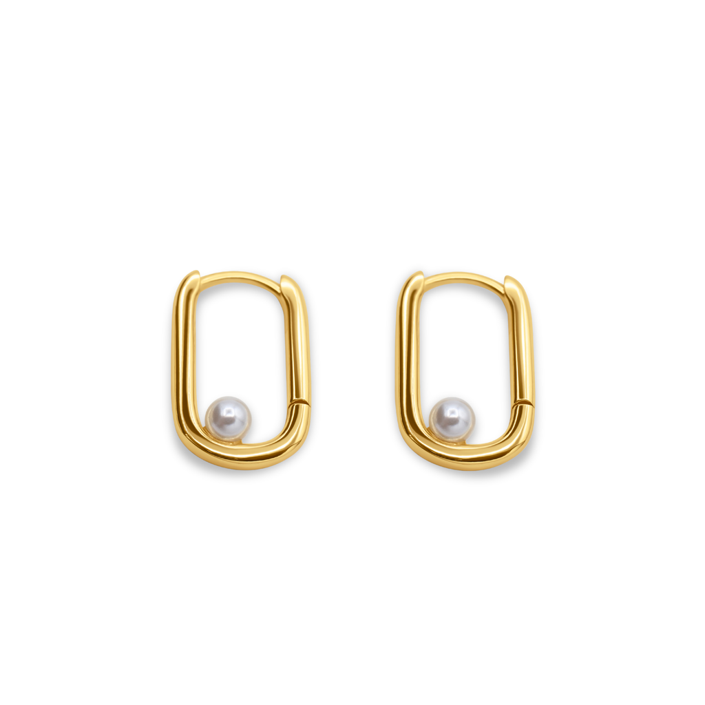 Gold hoop earrings with pearl centers on a white background-Selene-Pearl-Hoops-J.Collins Jewelry