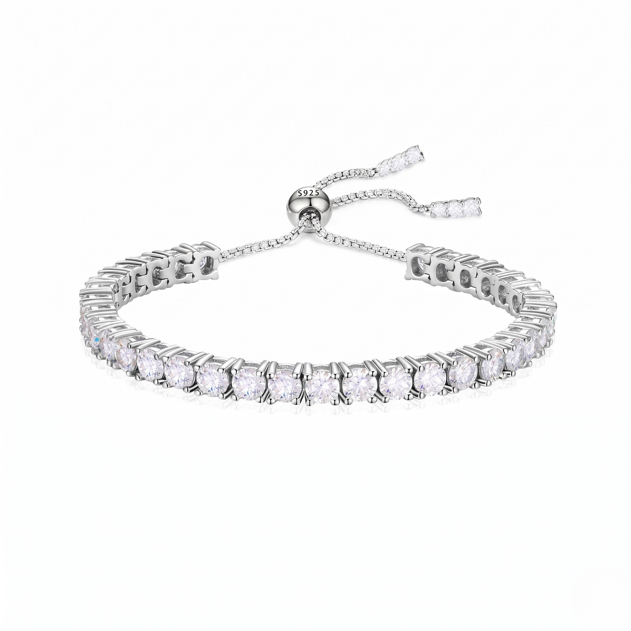 Silver bracelet with clear stones on a white background. - Slider Tennis Bracelet - J. Collins Jewelry