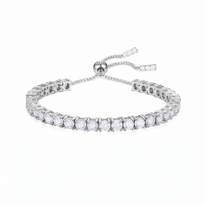 Silver bracelet with clear stones on a white background. - Slider Tennis Bracelet - J. Collins Jewelry