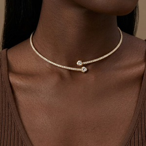 Gold Full Pavé Diamond Open-End Torque Choker Necklace with Graduating Solitaire Diamond Terminals Worn on Female Neck with Brown Knit Top - J. Collins Jewelry 