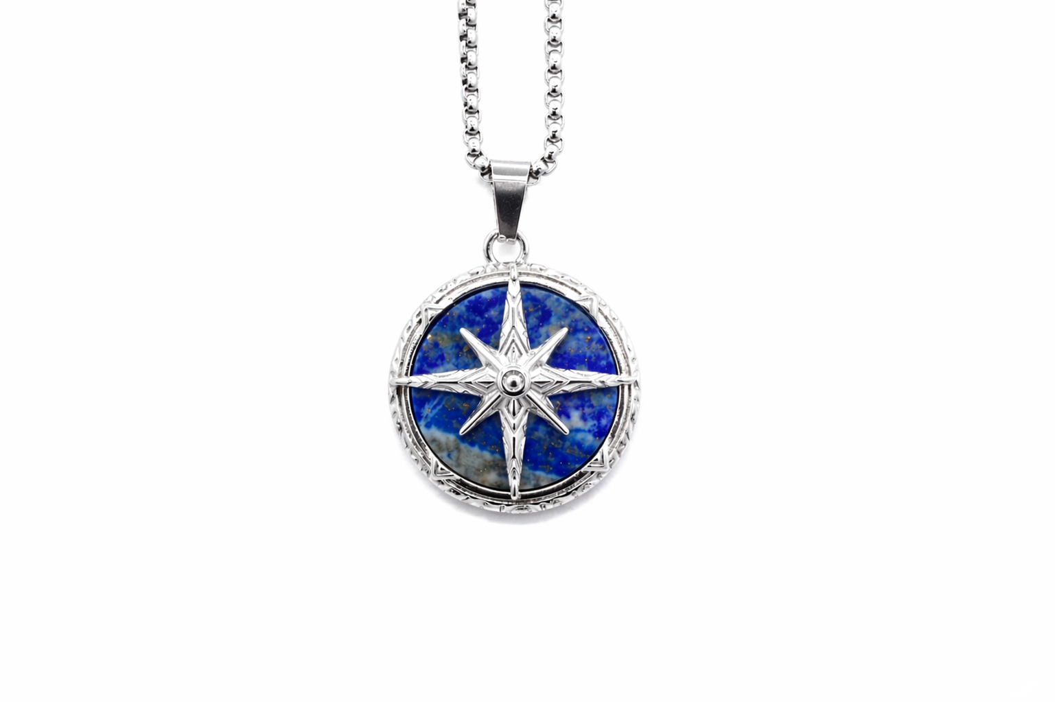 Silver necklace with a blue stone pendant on a white background- J.Collins Jewelry