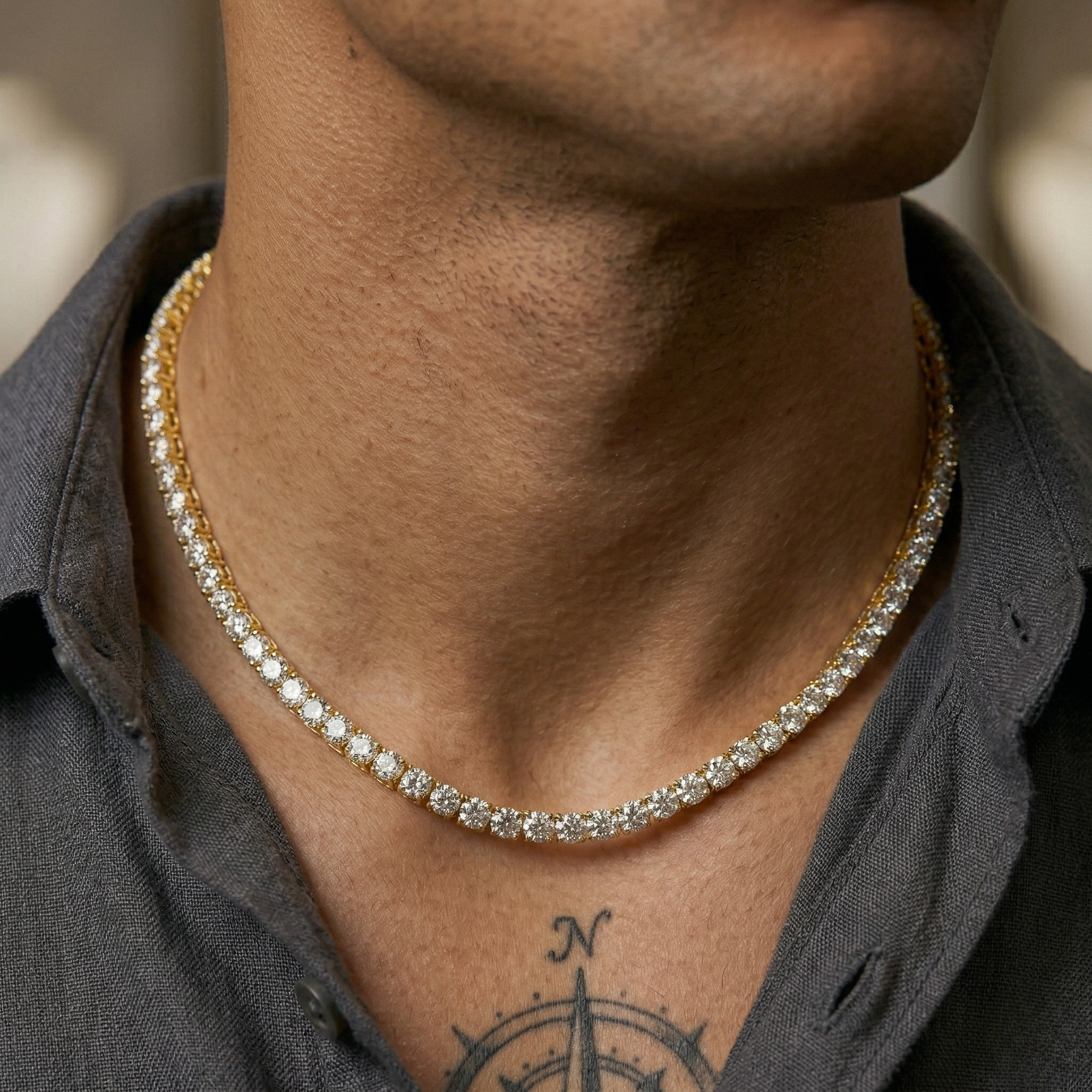 Close-up of a person wearing a Tennis necklace with a blurred background-J.Collins Jewelry
