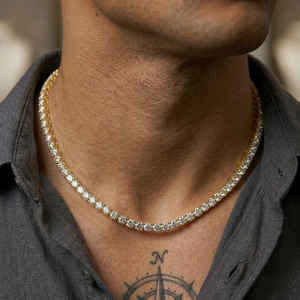 Close-up of a person wearing a Tennis necklace with a blurred background-J.Collins Jewelry