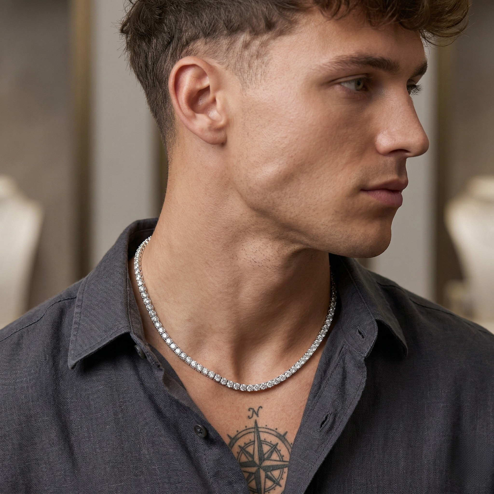 Man wearing a tennis necklace with a neutral background - Tennis Chain 5mm (Silver) by J.Collins Jewelry 