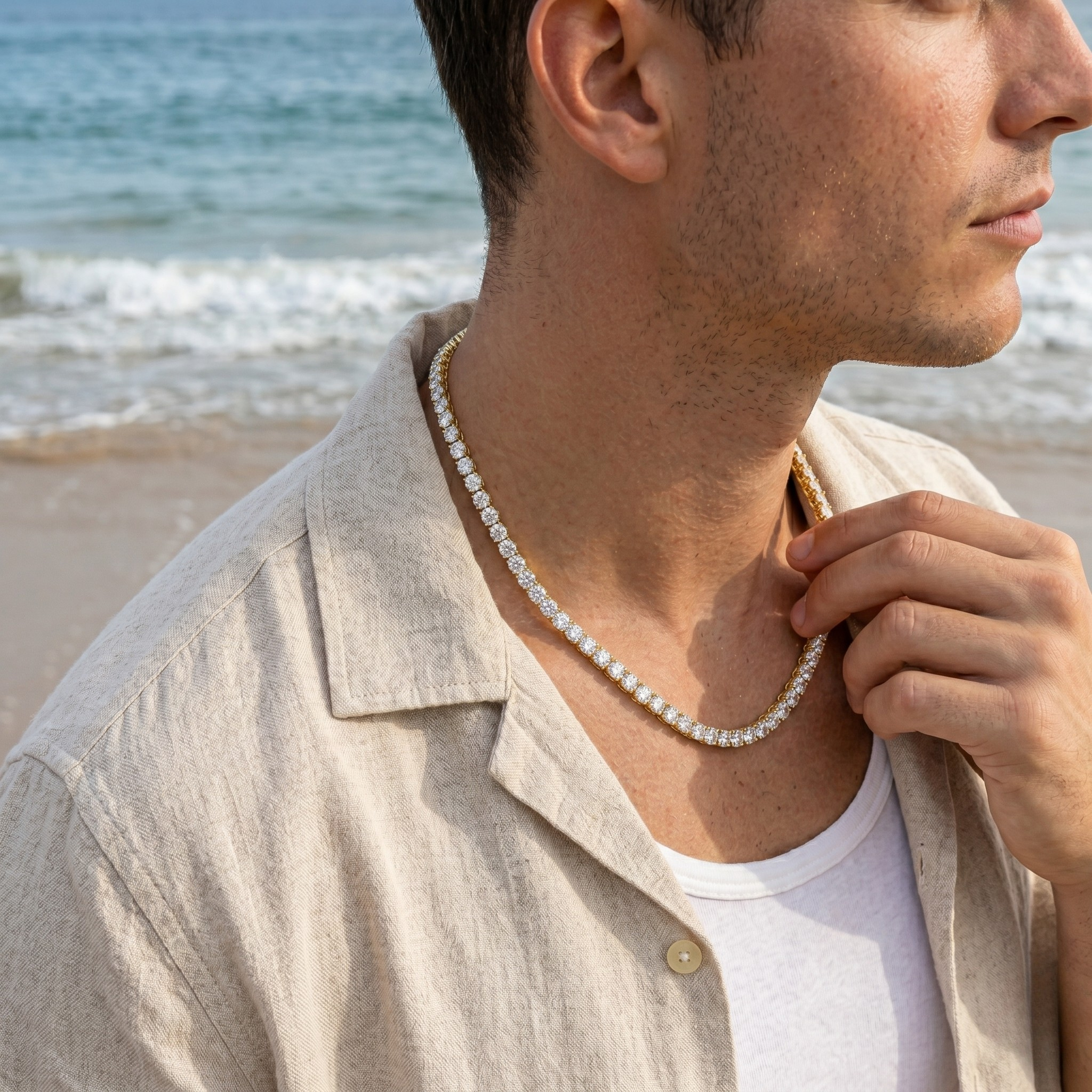 Man wearing a Tennis necklace on a beach - Tennis Chain 5mm (Gold) - J.Collins Jewelry